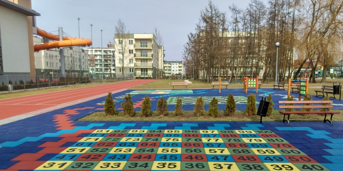 Large play area with colorful plates and games